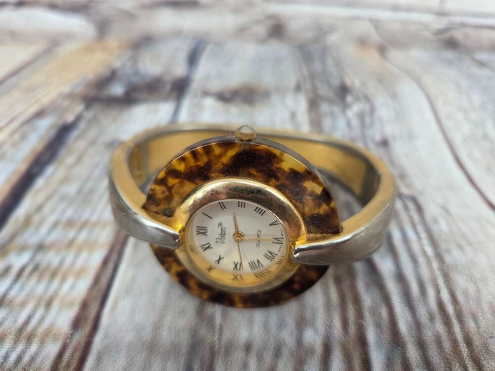 READ Vivani Wristwatch Gold Toned Cuff Band Roman Numerals Animal Print